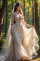 a woman in a wedding dress standing in the woods